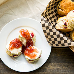 Petit scones with jam and cream thumbnail